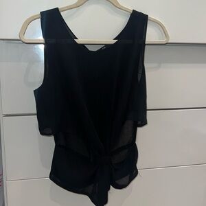 LIGHTLY WORN!! Black blouse w/cut outs on sides